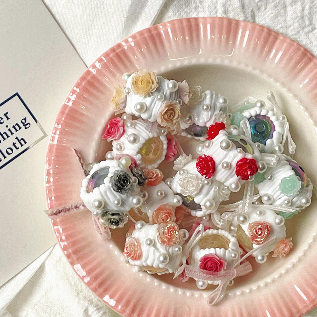 Key materials needed to make hand-painted beads?